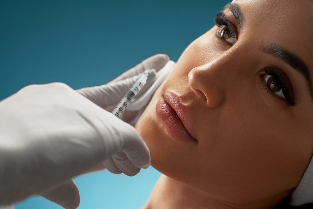 Closeup of face receiving Botox injection treatment