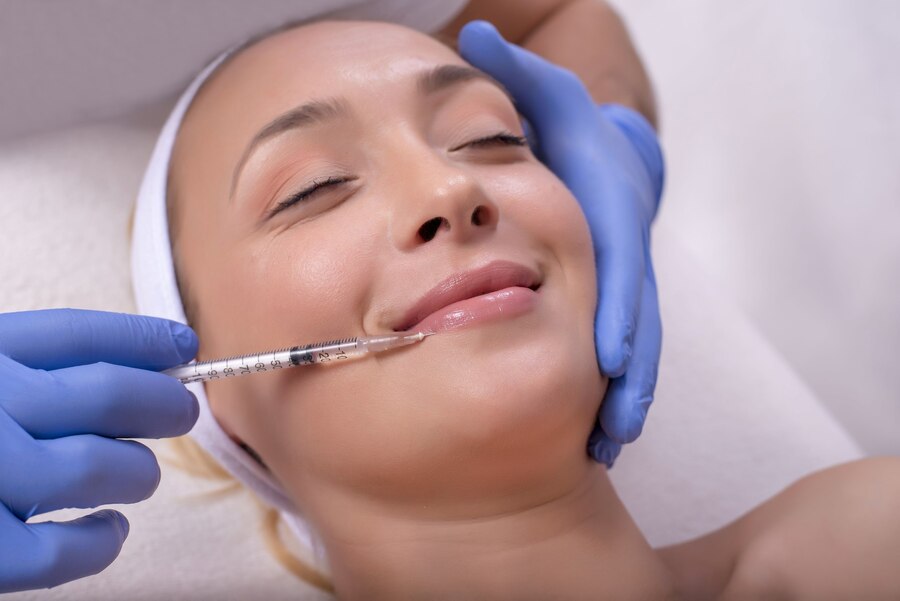 benefits of Sculptra face injections - Women Smiling And Taking Injections
